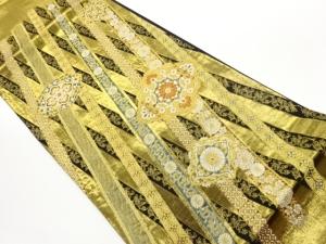 変わり縞に華紋・草花・七宝模様織出し袋帯